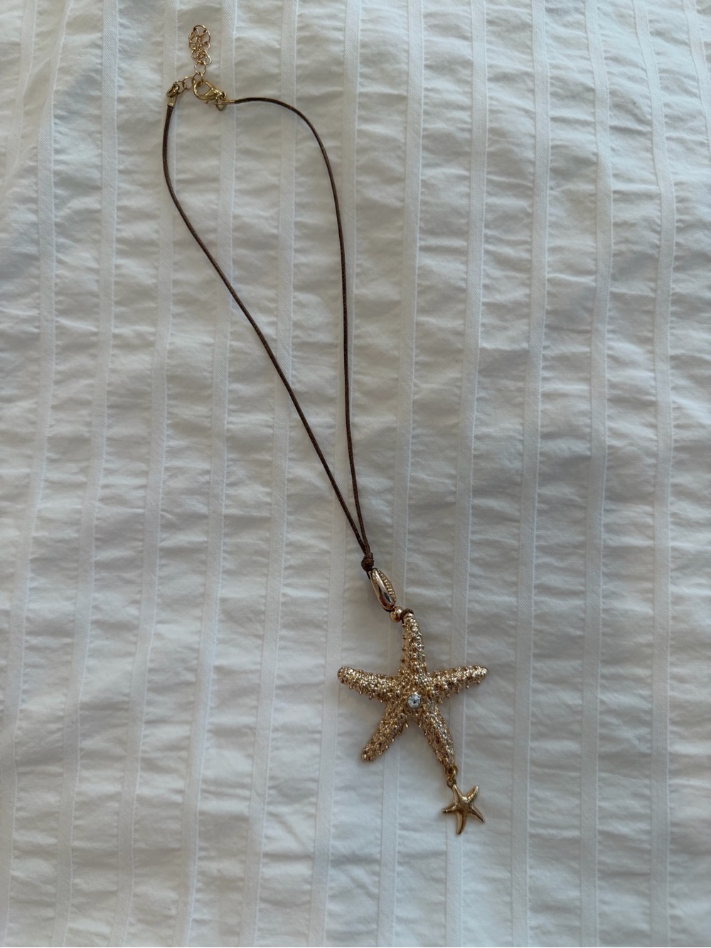 Golden starfish necklace
